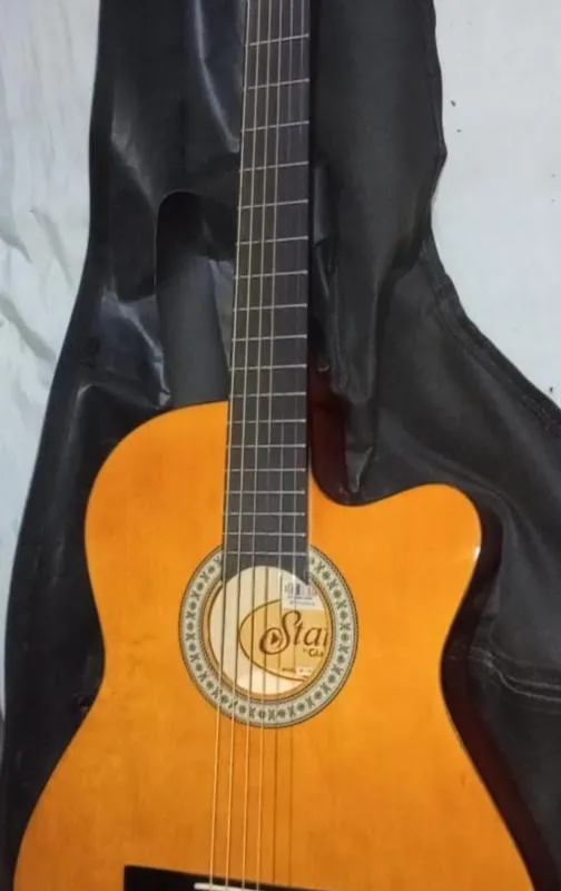 Imagem da campanha 1- Violão Giannini 1- Cabo 1- Capa