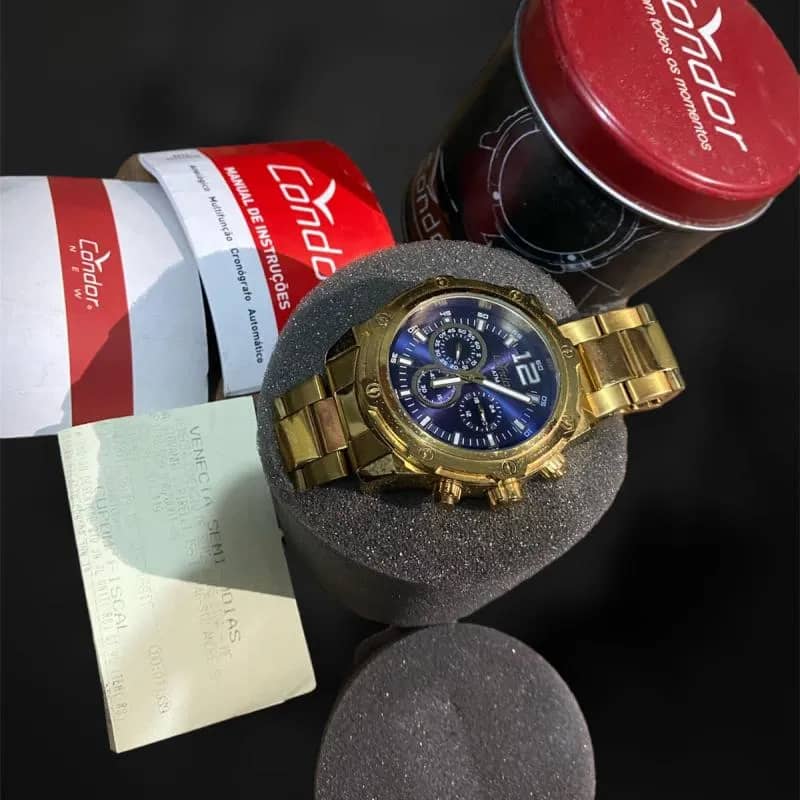 Imagem da campanha Relógio Condor com nota fiscal, manual e caixa original.