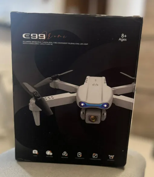 Imagem da campanha E99 Dobrável Quadcopter Drone, Controle Remoto Handle, Quatro Axis Aircraft, HD 4K Fotografia, UAV Altitude Fixação