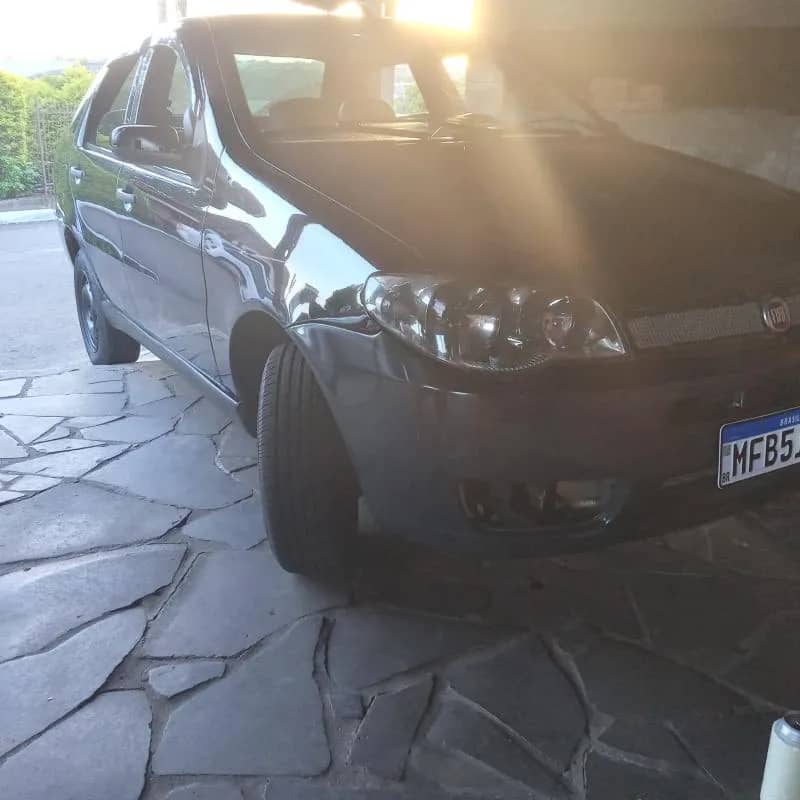 Imagem da campanha Por apenas 0,70 centavos você concorre a um Siena 1.0 2007 na cor azul completo e mais dois prêmios de 1000 cada