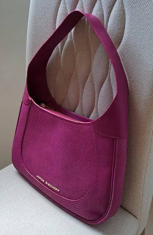 Imagem da campanha Bolsa JORGE BISCHOFF novíssima.