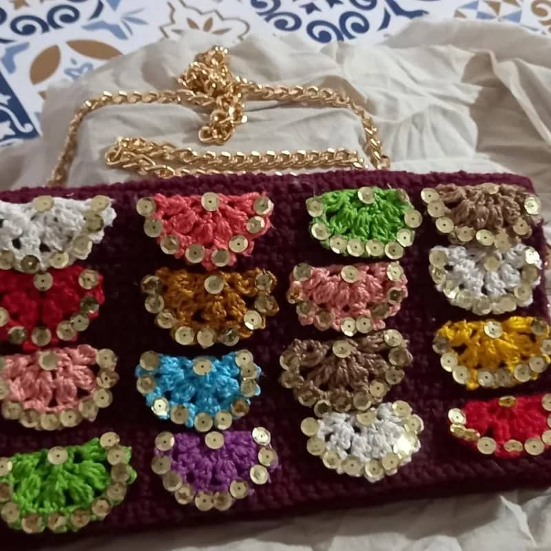 Imagem da campanha Linda Clutch de crochê