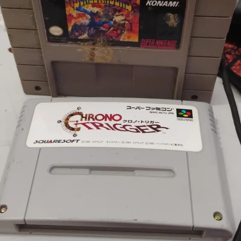 Imagem da campanha Dois  Cartuchos de SNES Chono trigger e sunset riders reprom