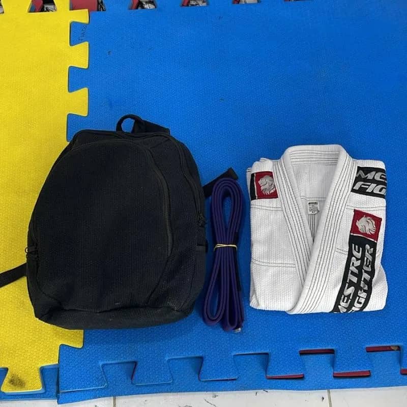 Imagem da campanha Kimono + Faixa + Mochila Mestre Fighter